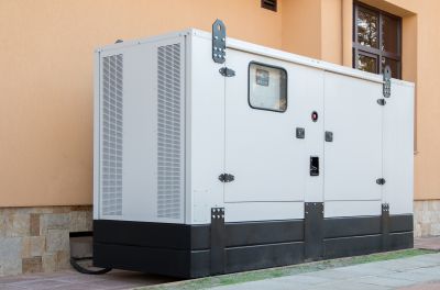 Technician Inspecting Generator